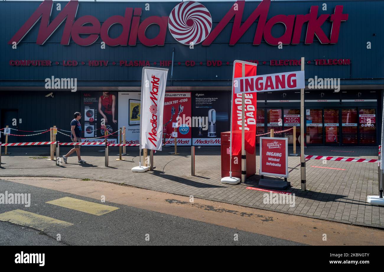 The entrance of Media markt with stickers to help people keep their  distance in Oostakker, Belgium on May 9, 2020. Belgium will start phase two  with the opening of shops allowing more