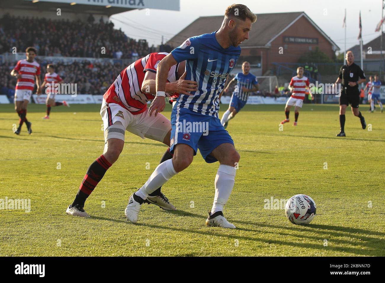Nicky Deverdics of Hartlepool United in action with Doncaster Rovers' Craig Alcock during the SKY Bet League 2 match between Hartlepool United and Doncaster Rovers at Victoria Park, Hartlepool, UK on 6th May 2017. (Photo by Mark Fletcher/MI News/NurPhoto) Stock Photo
