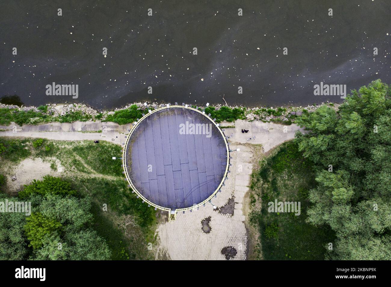 A water supply tower is seen on the right bank of the Vistula river in