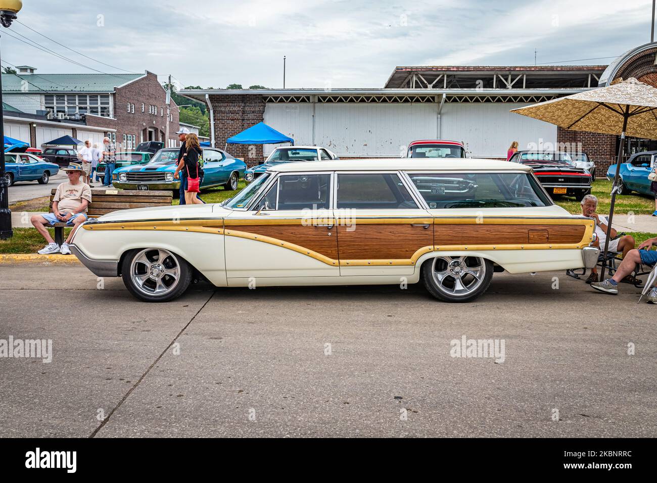 Des Moines, IA - July 01, 2022: High perspective side view of a 1964 Mercury Colony Park Station Wagon at a local car show. Stock Photo