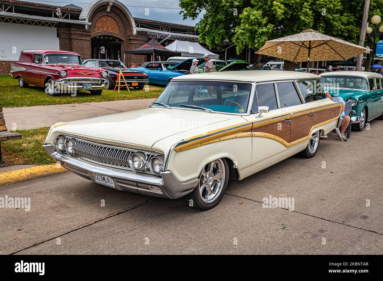 Des Moines, IA - July 01, 2022: High perspective front corner view of a 1964 Mercury Colony Park Station Wagon at a local car show. Stock Photo