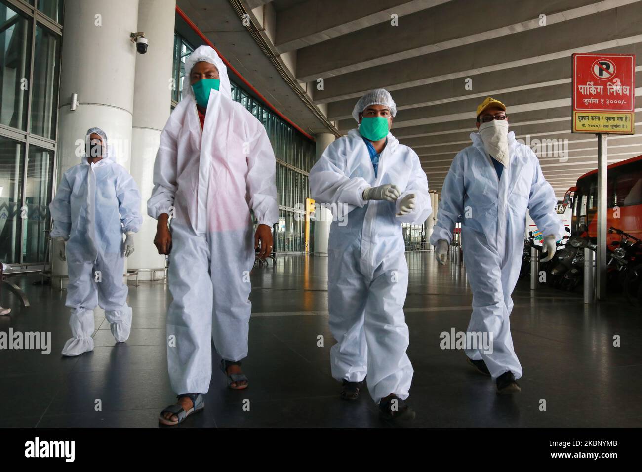 Health Worker wait to screen passenger traveling fro Bangladesh during a nationwide lockdown imposed as a preventive measure against the COVID-19 coronavirus on May 18,2020 in NSCBI Air Port in Kolkata,India.The first repatriation flight to West Bengal under the Vande Bharat Mission landed at the Kolkata airport on Monday from Bangladesh with 169 people, including 16 in need of medical emergency treatment and a pregnant woman,External Affairs Minister S Jaishankar welcomed the passengers and thanked the Ministry of Civil Aviation and the West Bengal government for working in coordination to fa Stock Photo