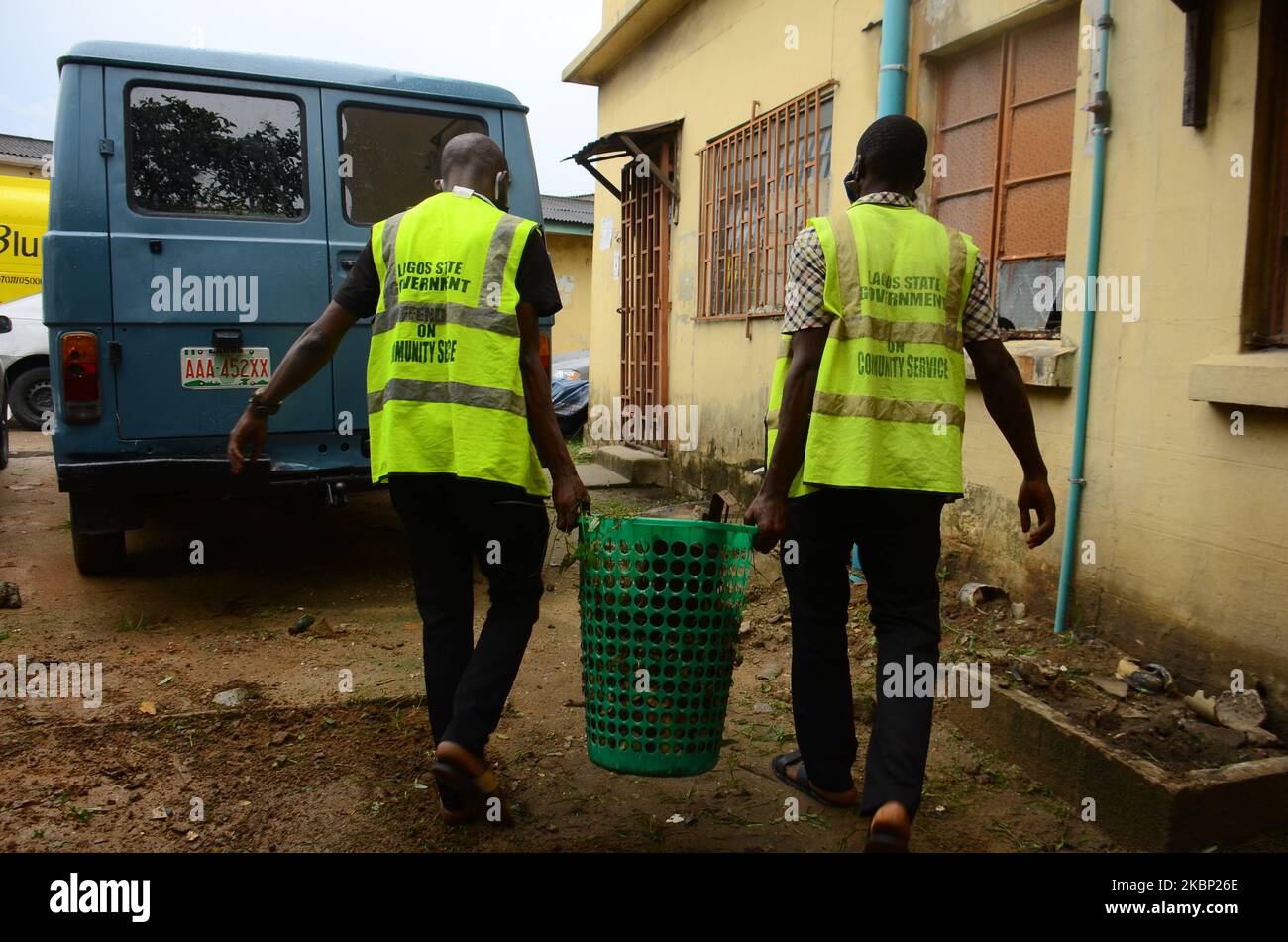 Coronavirus COVID-19 offenders during there community service in Lagos, after the Lagos State Special Offences (Mobile) Court sentenced 202 persons to community service and a fine of N5,000 each for violating the stay-at-home meant to contain the spread of the Covid-19 pandemic on Tuesday 19, May 2020. (Photo by Olukayode Jaiyeola/NurPhoto) Stock Photo