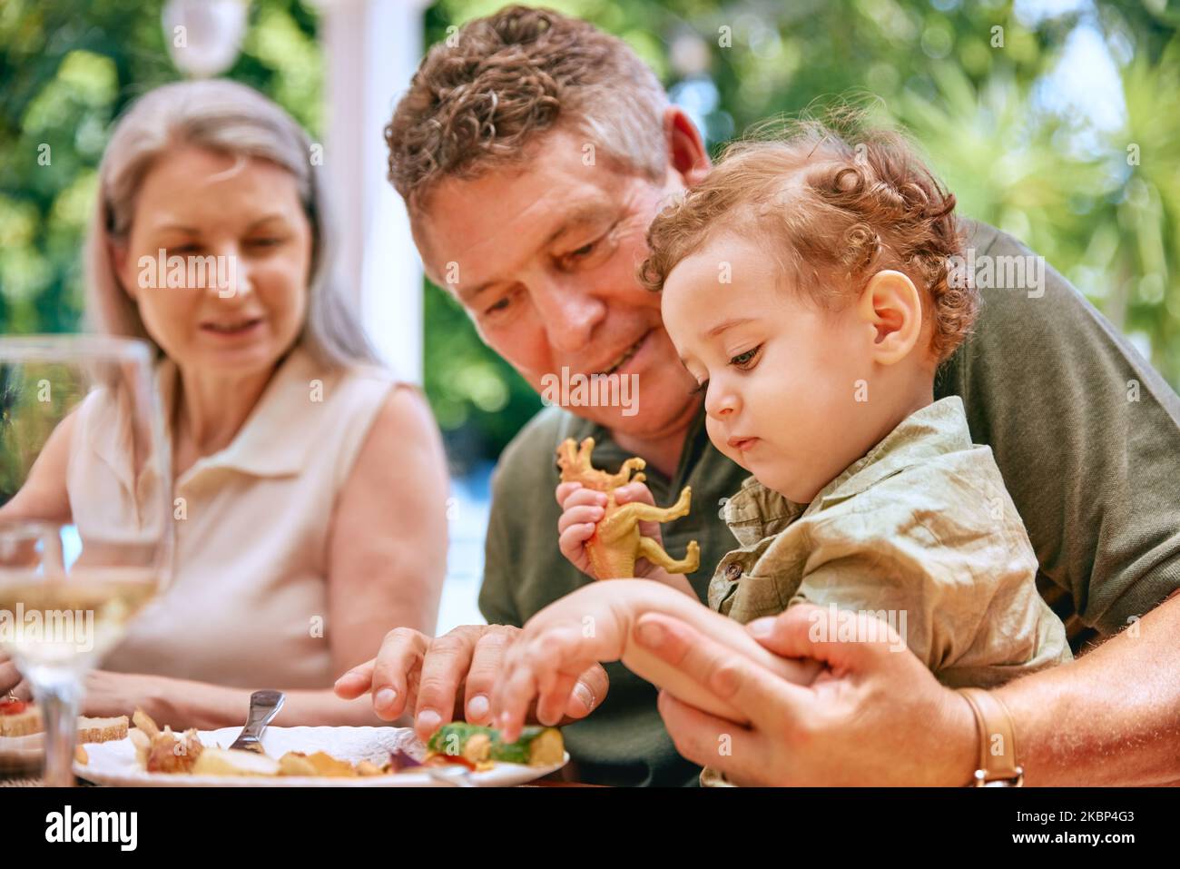 Food, grandpa and baby on lap eating vegetables for healthy, diet and