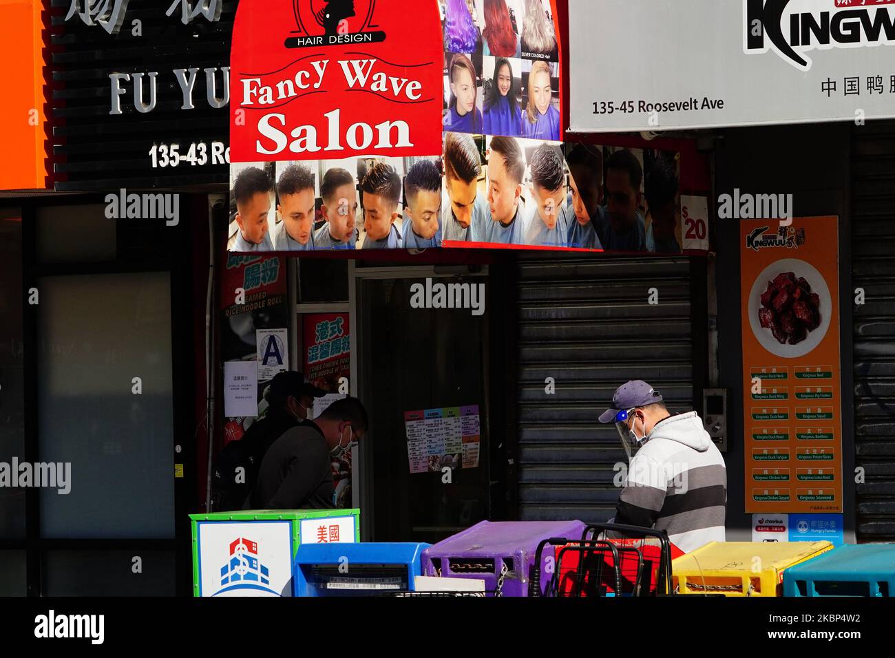 A view of hair salon during the coronavirus pandemic on May 20, 2020 in Main St., Borough of Queens in New York City. COVID-19 has spread to most countries around the world, claiming over 316,000 lives with over 4.8 million infections reported. (Photo by John Nacion/NurPhoto) Stock Photo