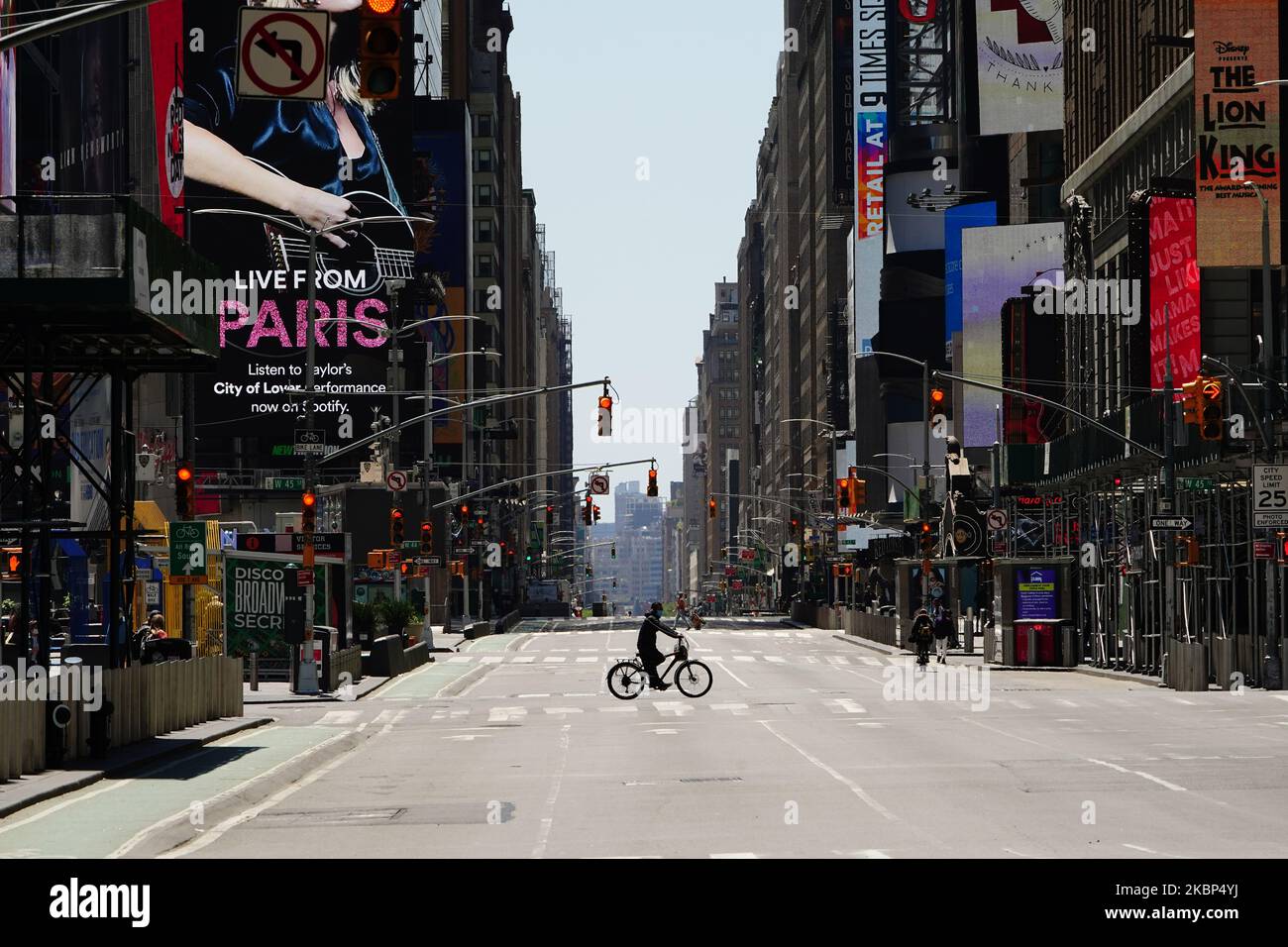 A view of a lone cyclist in Times Square during the coronavirus ...