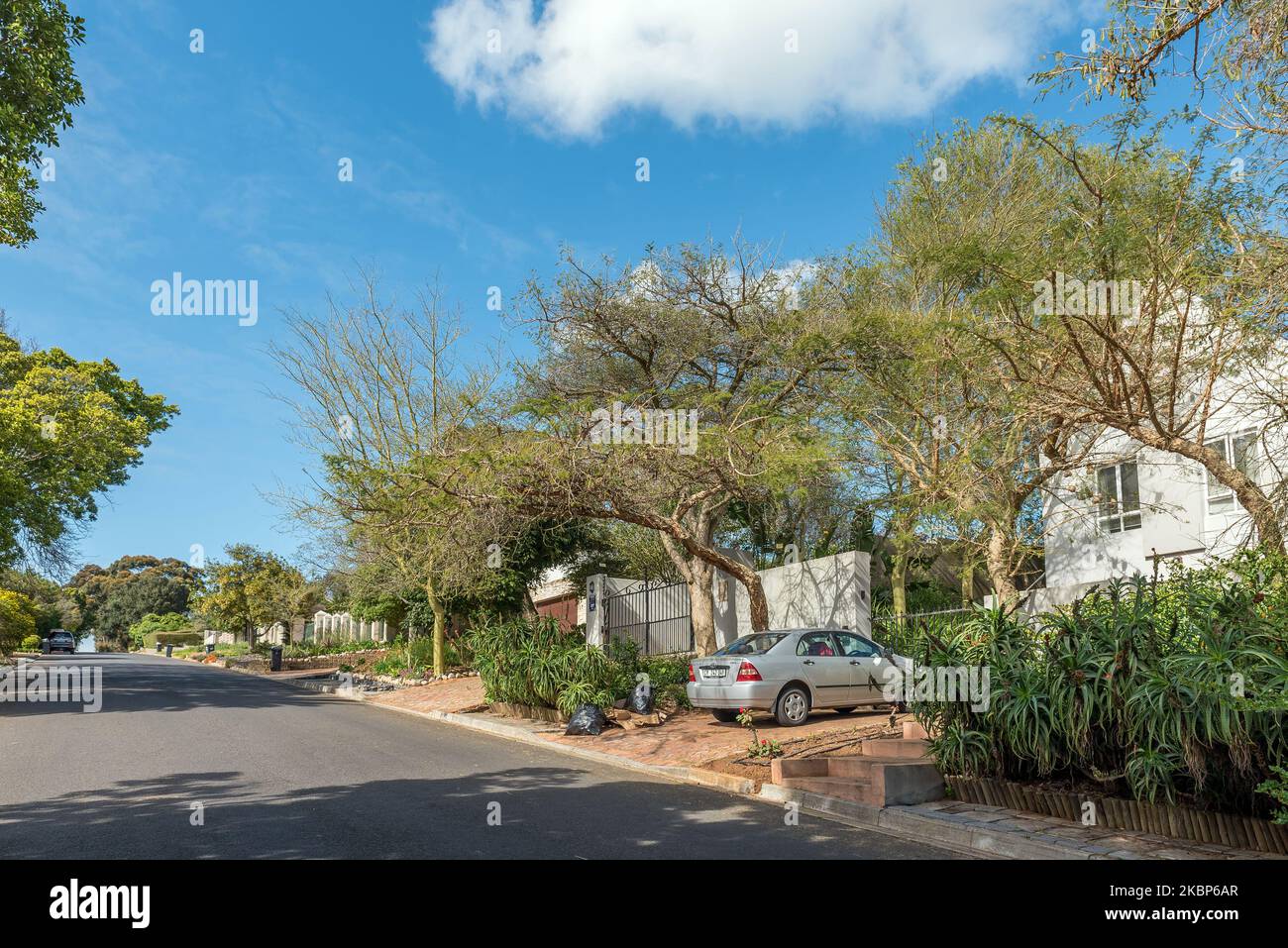 DURBANVILLE, SOUTH AFRICA - SEP 12, 2022: A street scene, with houses and vehicles, in Durbanville in the Cape Town metroplitan area Stock Photo
