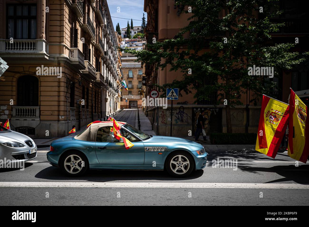 A luxury car with spanish flags during a car demonstration protest against the government of spanish Prime Minister, Pedro Sanchez, and its management of the Coronavirus crisis in Granada on May 23, 2020. The far-right party demand the end of confinement and state of emergency because they consider that limit their rights and all Spaniards. (Photo by Fermin Rodriguez/NurPhoto) Stock Photo