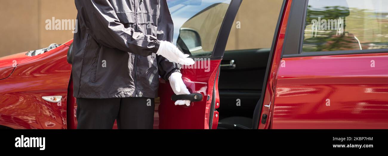 Valet Car Parking Man With Open Door Stock Photo Alamy