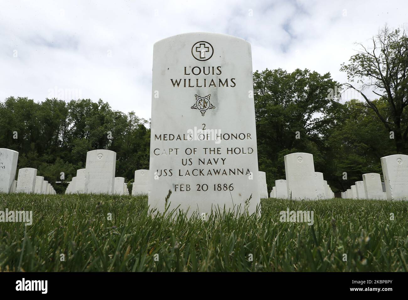 The grave stone of US Sailor Louis Williams, a recipient of two Medals of Honor, is seen at Cypress Hill Cemetery, in the Brooklyn Borough of New York City USA on May, 24, 2020. Memorial Day is an American holiday which commemorates the men and women who died while serving in the U.S. military. (Photo by John Lamparski/NurPhoto) Stock Photo