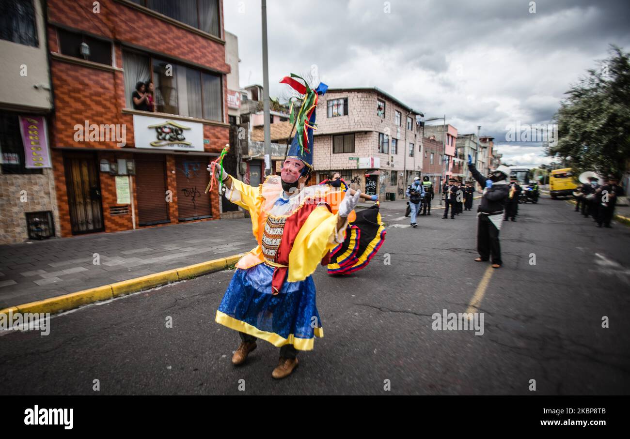 The municipal band of the city of Quito parades in neighborhoods in the