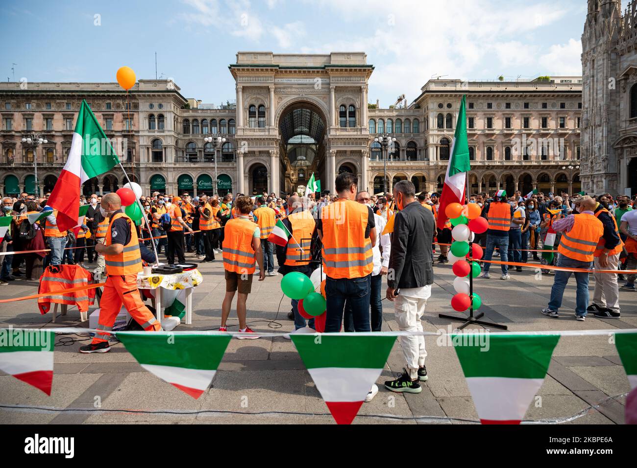 The “Gilet Arancioni” protest in Piazza Duomo with orange vest and Italian flags during the Phase 2 of Coronavirus (COVID-19) National Lockdown on May 30, 2020 in Milan, Italy. (Photo by Alessandro Bremec/NurPhoto) Stock Photo
