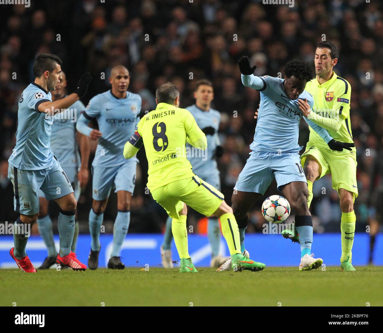 Wilfried Bony of Manchester City battles with Sergio Busquets and Andres Iniesta of Barcelona during the UEFA Champions League Round of 16 1st Leg between Manchester City and FC Barcelona at the Etihad Stadium, Manchester on Tuesday 24th February 2015 (Photo by Mark Fletcher/MI News/NurPhoto) Stock Photo