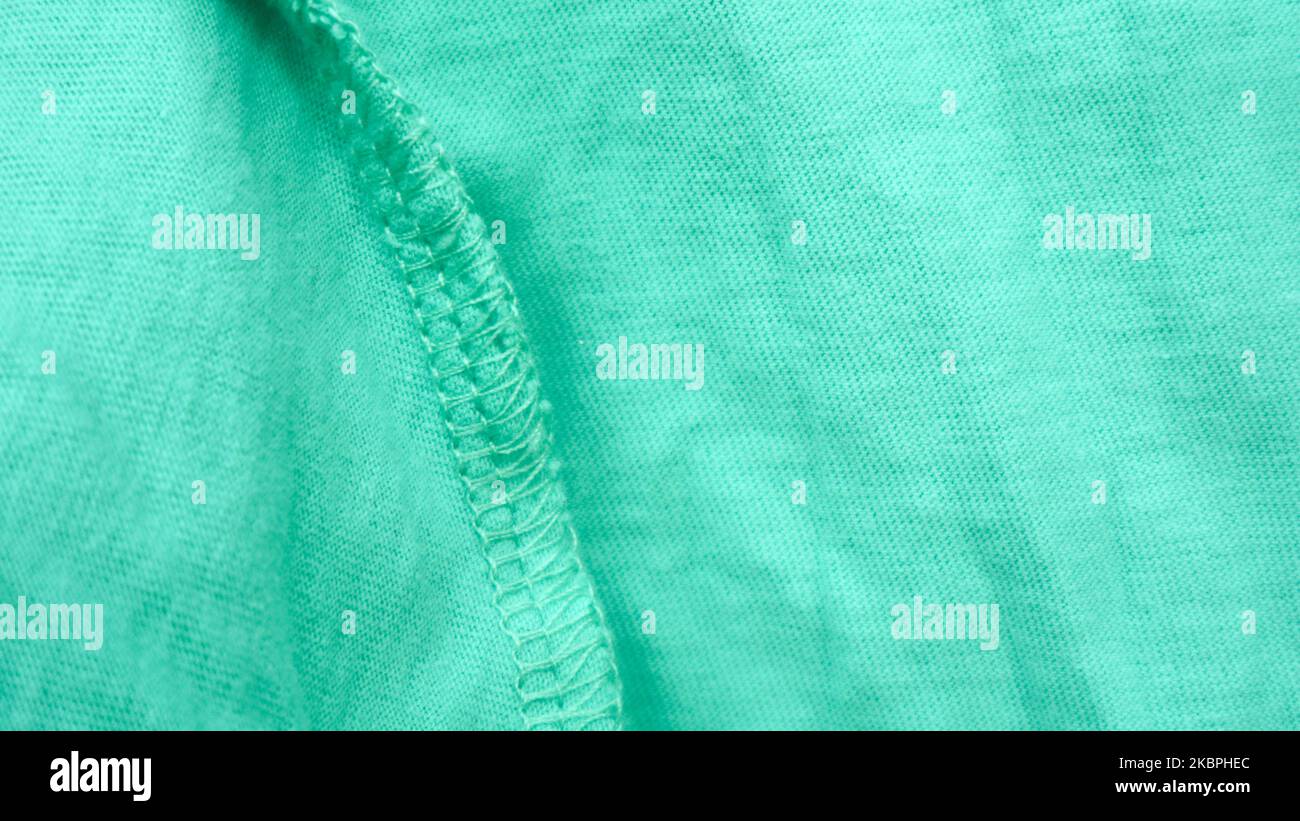 green fabric texture as background Stock Photo - Alamy