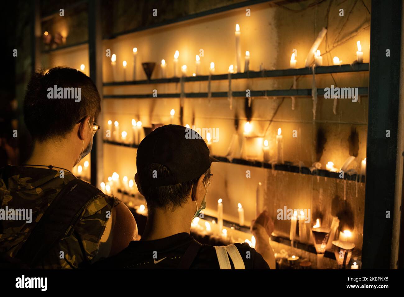 Candles candles are lit for the fallen as thousands defy police ban in Hong Kong to commemorate Tiananmen Massacre in Hong Kong, China on June 4, 2020. (Photo by Simon Jankowski/NurPhoto) Stock Photo