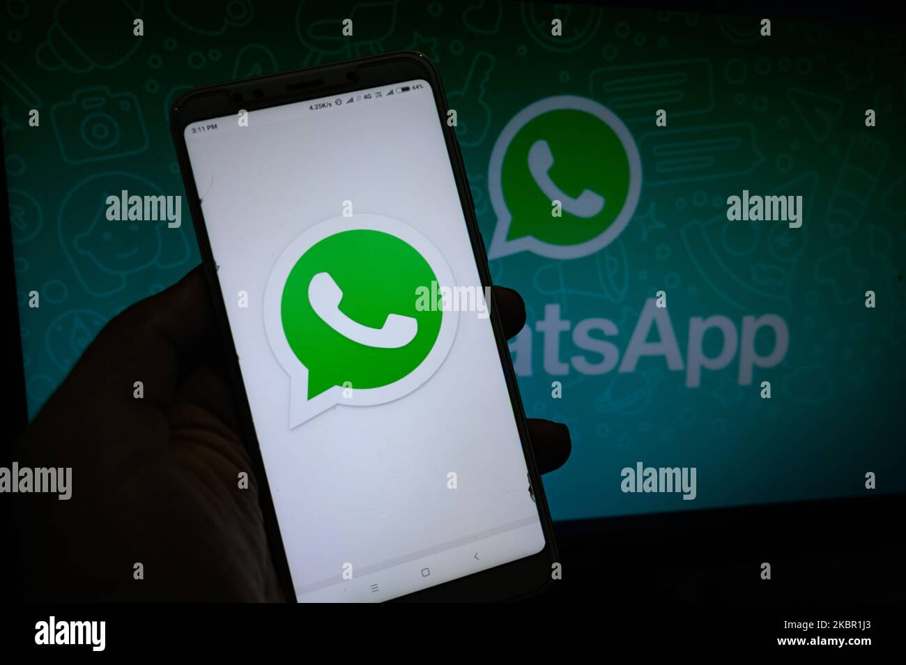 In this illustration photo, the logo of WhatsApp is displayed on a smartphone in Tehatta, Nadia, West Bengal, India on June 10, 2020. WhatsApp regularly comes with new features and updates that make the messaging experience better. Recently, WhatsApp rolled out Dark Mode, increased group voice and video call limit from four to eight, restricted frequently forwarded messages to be sent to more than one chat at a time. (Photo Illustration by Soumyabrata Roy/NurPhoto) Stock Photo