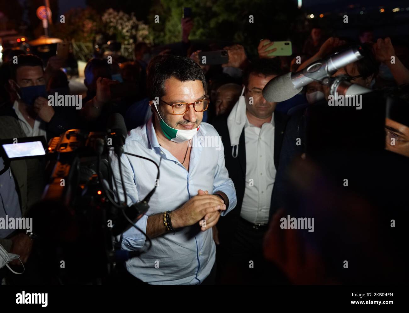Italian Lega Party Secretary Matteo Salvini talks to journalists and people during the election visit to the Sicily region while dozens of protesters contest it in Milazzo, Sicily, Italy, on June 12, 2020. (Photo by Gabriele Maricchiolo/NurPhoto) Stock Photo