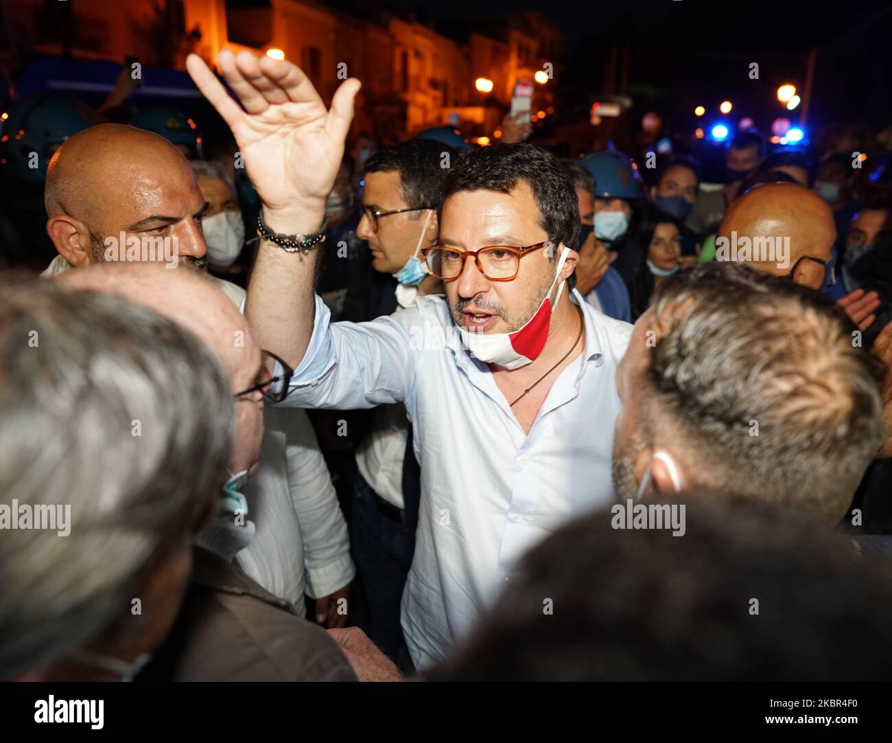 Italian Lega Party Secretary Matteo Salvini talks to journalists and people during the election visit to the Sicily region while dozens of protesters contest it in Milazzo, Sicily, Italy, on June 12, 2020. (Photo by Gabriele Maricchiolo/NurPhoto) Stock Photo