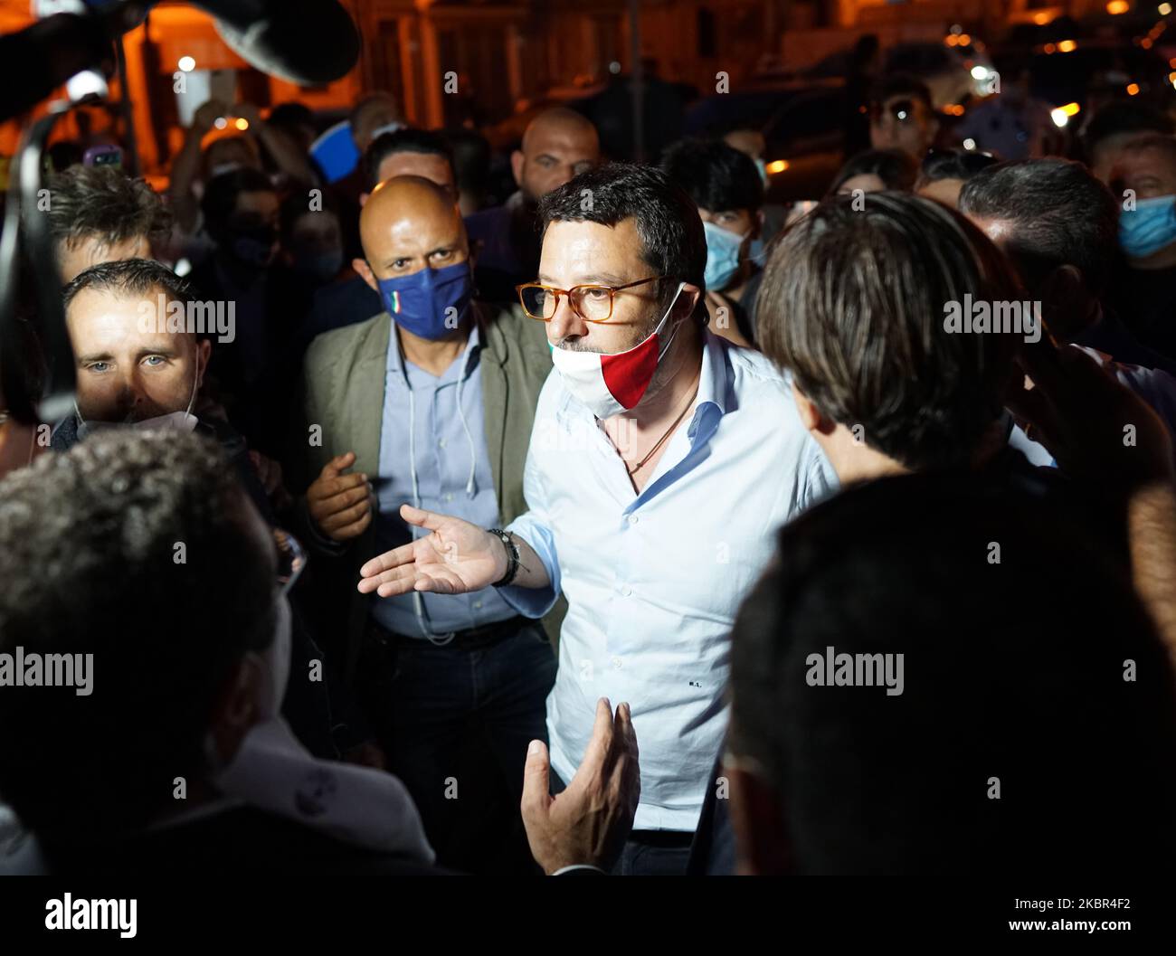 Italian Lega Party Secretary Matteo Salvini talks to journalists and people during the election visit to the Sicily region while dozens of protesters contest it in Milazzo, Sicily, Italy, on June 12, 2020. (Photo by Gabriele Maricchiolo/NurPhoto) Stock Photo