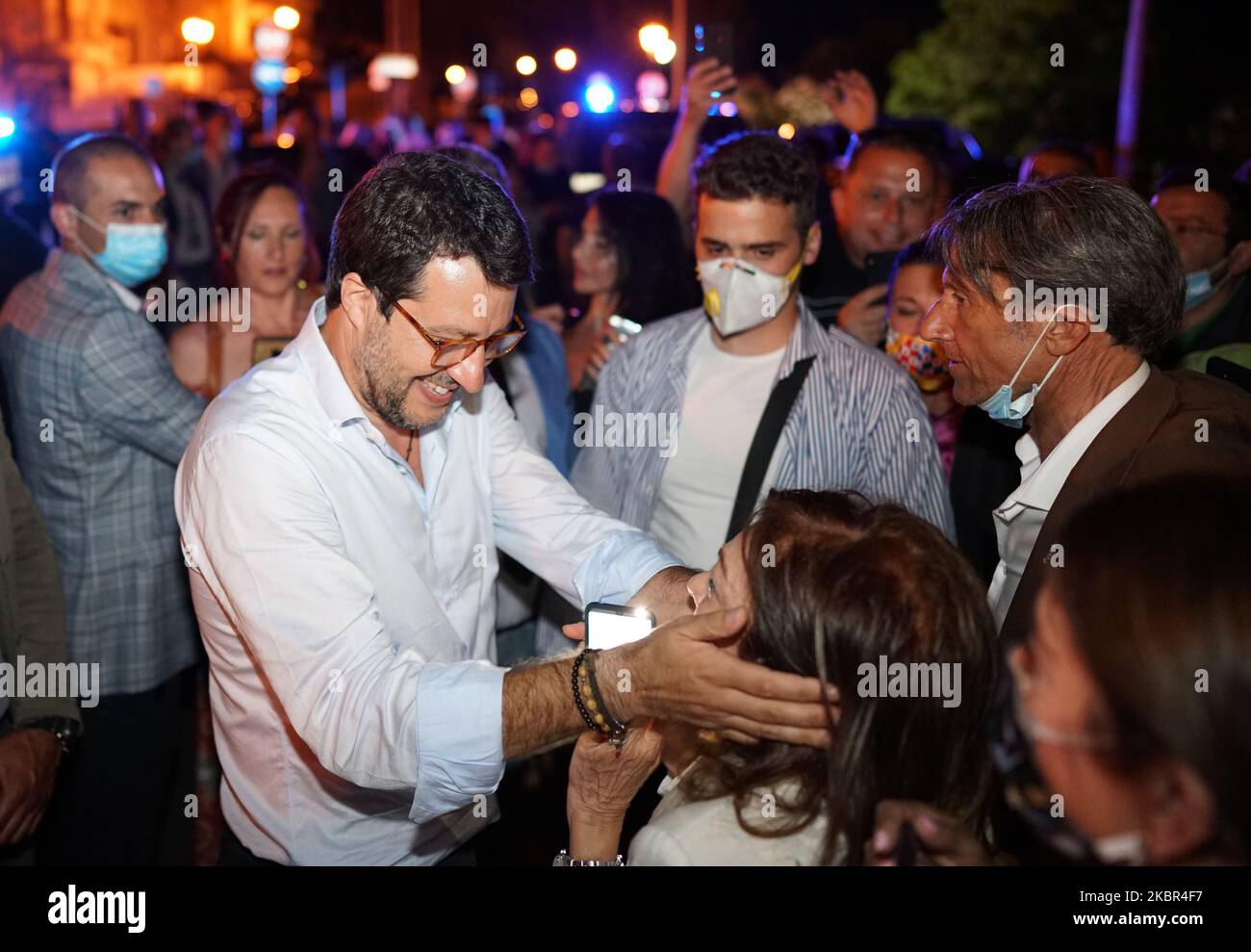 Italian Lega Party Secretary Matteo Salvini embrace a supporter during the election visit to the Sicily region in Milazzo, Sicily, Italy, on June 12, 2020. (Photo by Gabriele Maricchiolo/NurPhoto) Stock Photo