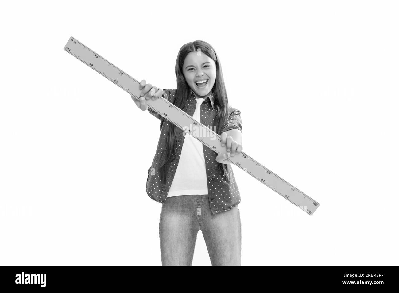 measuring and sizing. education for child. mathematics. cheerful teen girl with ruler. Stock Photo