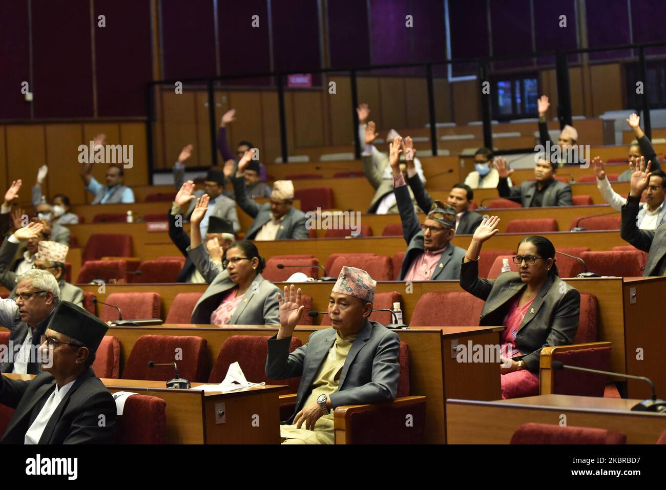 Nepal's National Assembly members gesture as they vote on Constitution amendment bill at Kathmandu, Nepal on Thursday, June 18, 2020. The National Assembly unanimously adopts Constitution amendment bill. (Photo by Narayan Maharjan/NurPhoto) Stock Photo