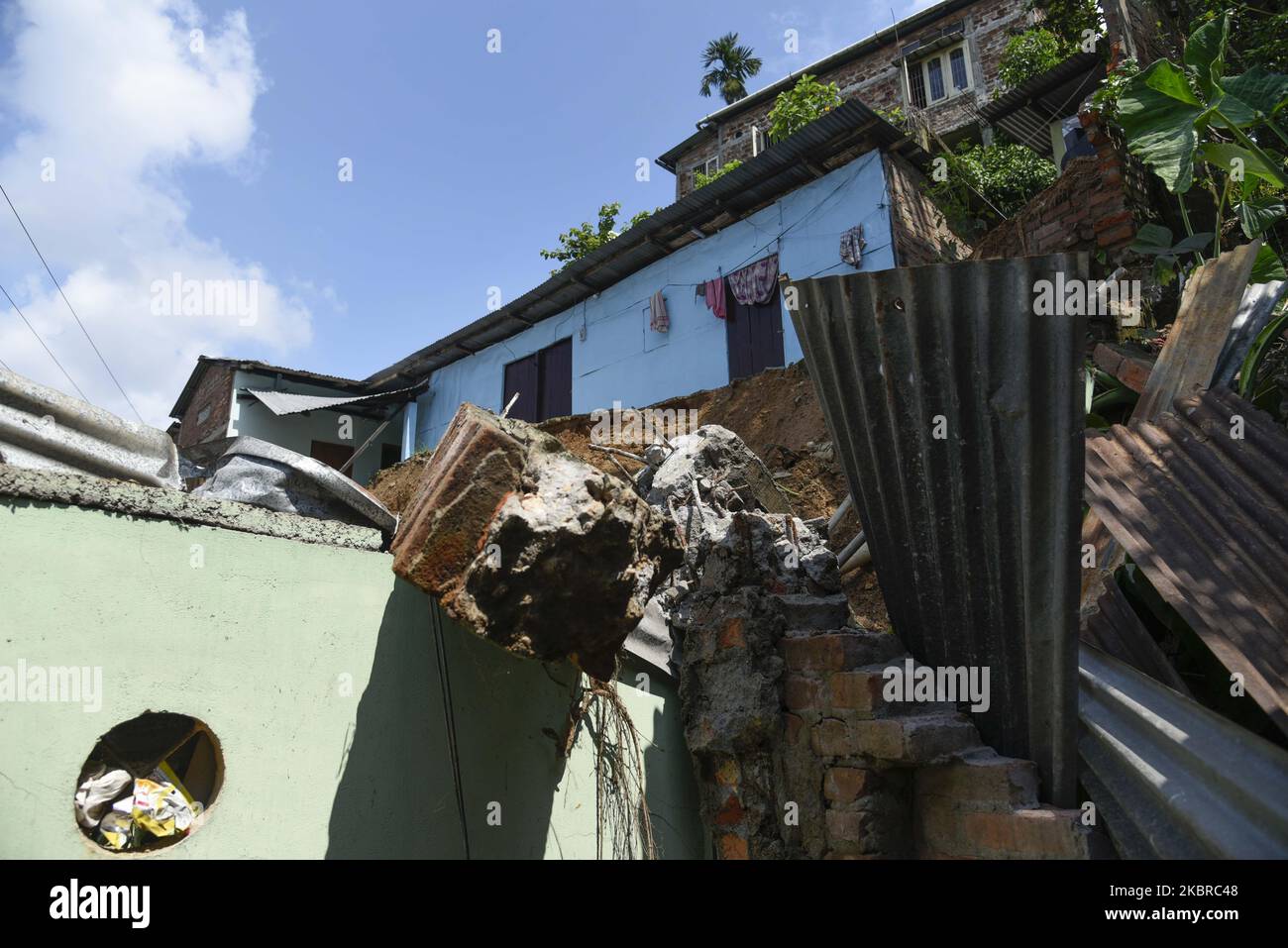 Debris piles after a landslide due to incessant rain, at Santipur Hillside in Guwahati, Assam, India on Friday, June 19, 2020. (Photo by David Talukdar/NurPhoto) Stock Photo