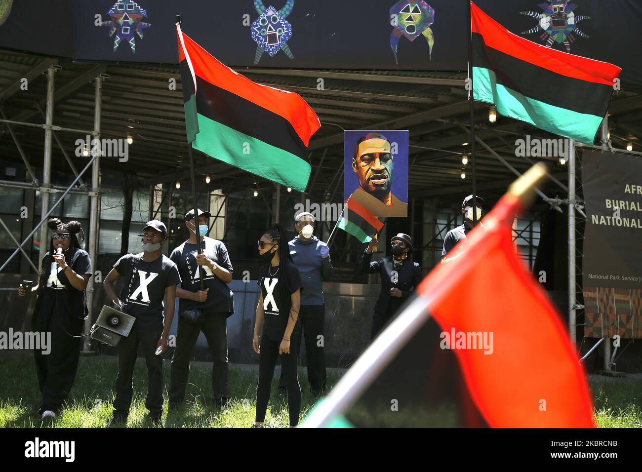 People march across the city, and pass near the African Burial Ground National Monument, on the 155th anniversary of Juneteenth in New York City ,US, June 19, 2020. The oldest nationally celebrated commemoration of the end of slavery dating to June 19, 1865. On that date, Union Soldiers arrived in Galveston Texas and announced the end of the Civil War and that all slaves are free according to federal law. (Photo by John Lamparski/NurPhoto) Stock Photo