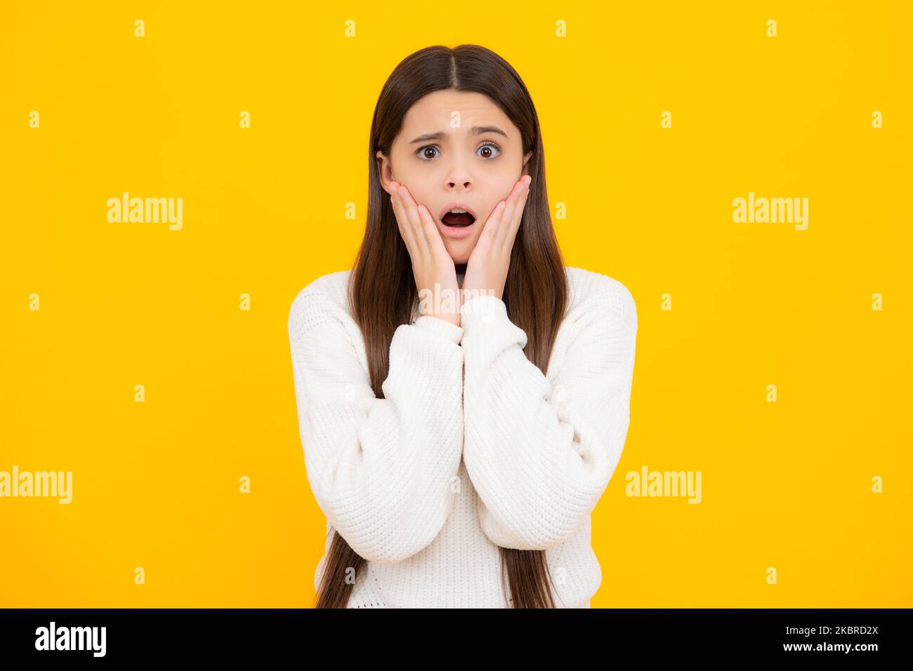 Unhappy upset teenager girl. Closeup portrait mad young child girl. Angry negative human emotion facial expression feeling attitude. Stock Photo