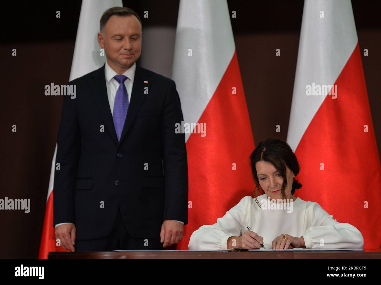 Andrzej Duda, the current Polish President and candidate for the presidential election 2020 and Teresa Halas, sign the program agreement with NSZZ 'S' Individual Farmers trade union, during his visit in Wierzchoslawice. President Duda laid a wreath at Wincenty Witos tumb, a Polish politician and leader of the Polish People's Party (PSL), who served three times as the Prime Minister of Poland in the 1920s. On Monday, June 22, 2020, in Wierzchoslawice, Lesser Poland Voivodeship, Poland. (Photo by Artur Widak/NurPhoto) Stock Photo