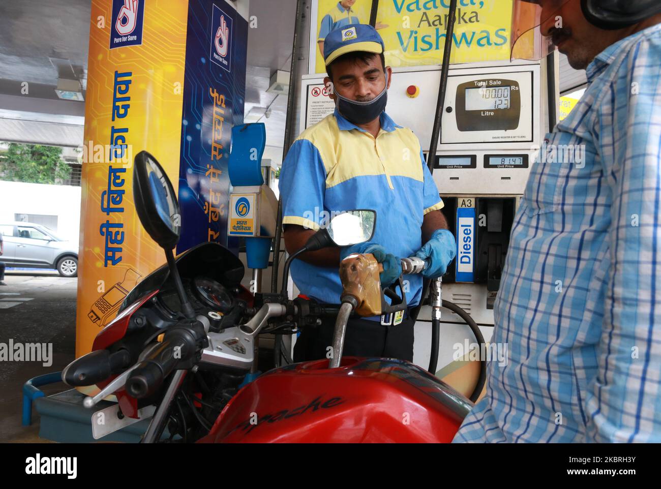 Indian petrol pump attendant hires stock photography and images Alamy