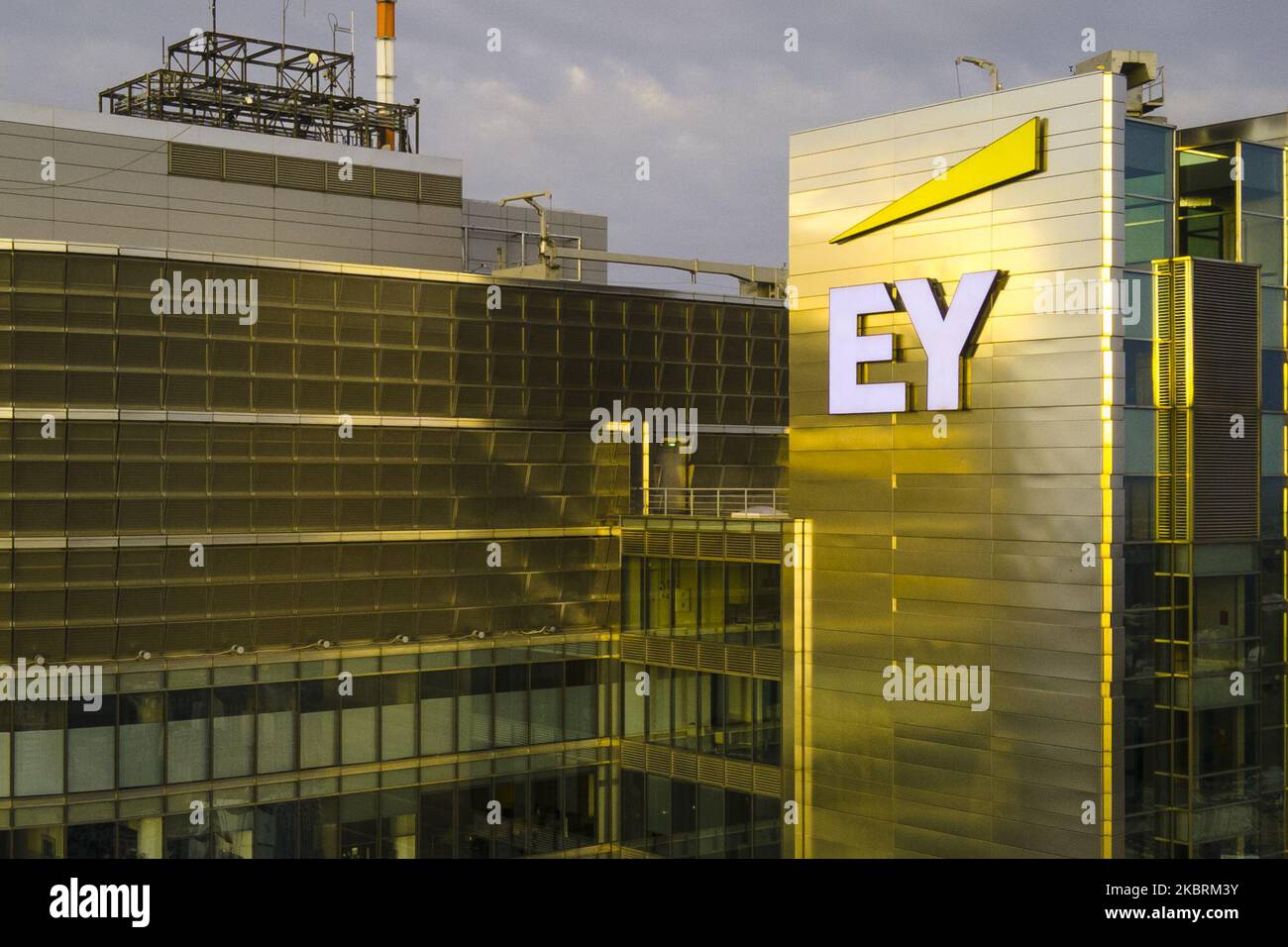 The Ernst and Young logo is seen on the Rondo 1 building on the Rondo ONZ roundabout on June 11, 2020 in Warsaw, Poland. (Photo by Jaap Arriens/NurPhoto) Stock Photo