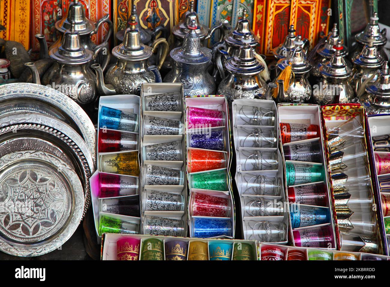 Traditional silver teapots and glasses at a shop in the souk in the