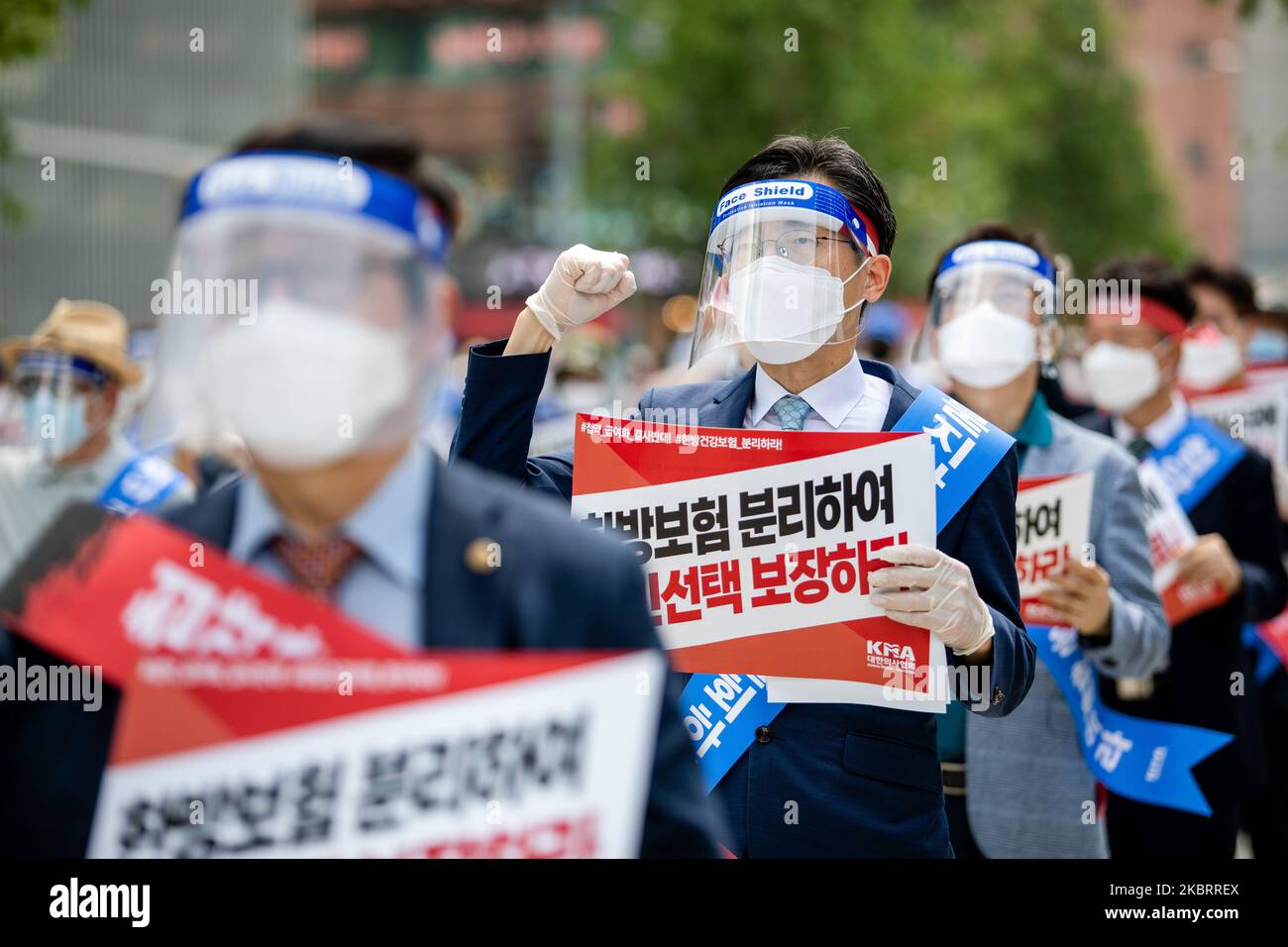 About hundred members of the Korean Medical Association hold a protest against the application of health insurance for Traditional Korean medicine at Hanbit squre in Seoul, South Korea on the June 28, 2020. The government plans to conduct a pilot project to apply health insurance benefits to the aftereffects of cerebrovascular disease, facial nerve paralysis, menstrual pain and will be confirmed at the Health Insurance Policy Review Committee meeting next month. (Photo by Chris Jung/NurPhoto) Stock Photo