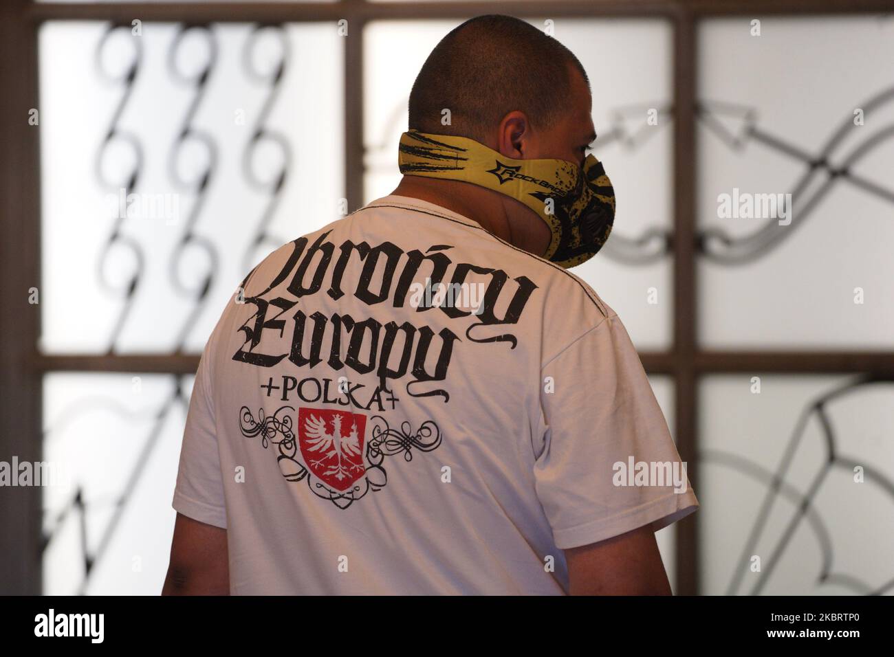 A man with a t-shirt with the words "Defender of Europe Poland" is seen at  a voting station on June 28, 2020 in Warsaw, Poland. (Photo by Jaap  Arriens/NurPhoto Stock Photo -