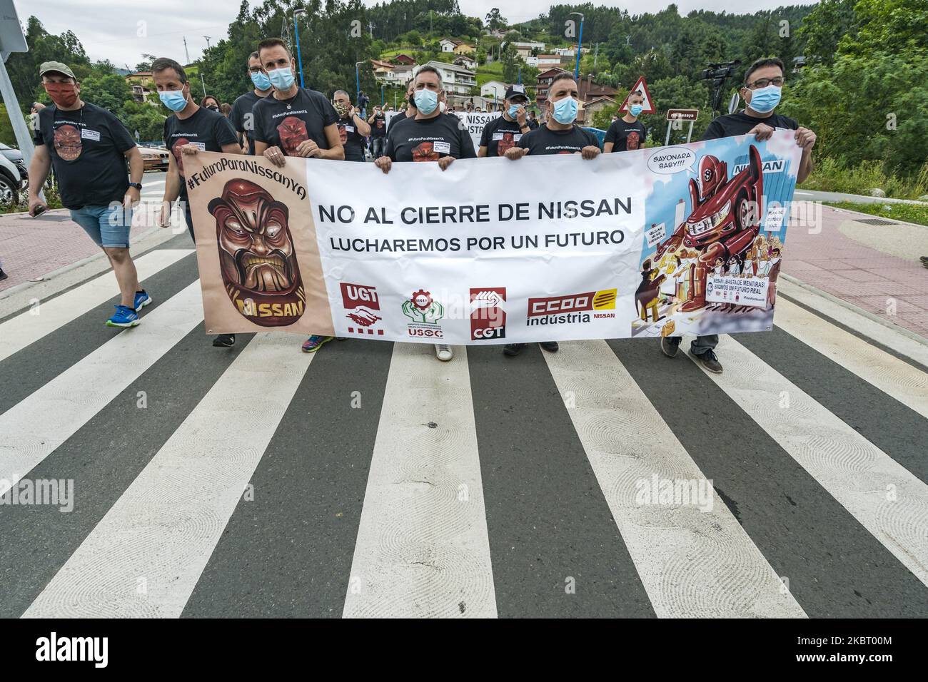 Front of the demonstration of fired workers of the Barcelona Nissan plant marching near the Cantabria Nissan plant, Spain, on July 1, 2020. They were asking for solidarity of another Nissan plants workers in Spain for not definitive close in Cataluna (Photo by Celestino Arce/NurPhoto) Stock Photo