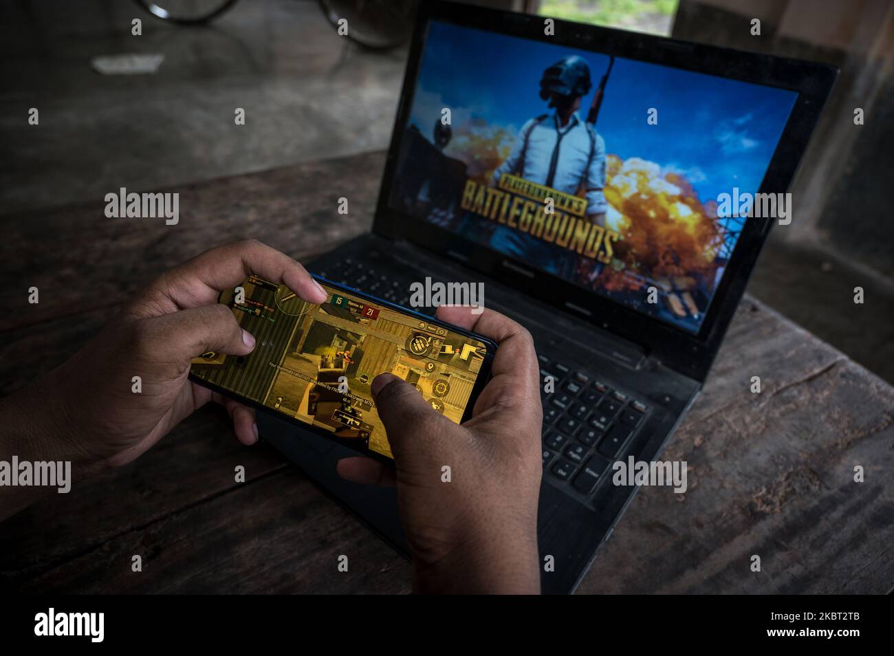 A boy plays PUBG at his home in Tehatta, Nadia, West Bengal, India on July 3, 2020. As Indians had to confine themselves to their homes due to the Coronavirush, many have turned to online games leading to a spike in app downloads and usage. India surfaced as the largest contributor in terms of the number of downloads for PlayerUnknown's Battlegrounds (PUBG). (Photo by Soumyabrata Roy/NurPhoto) Stock Photo