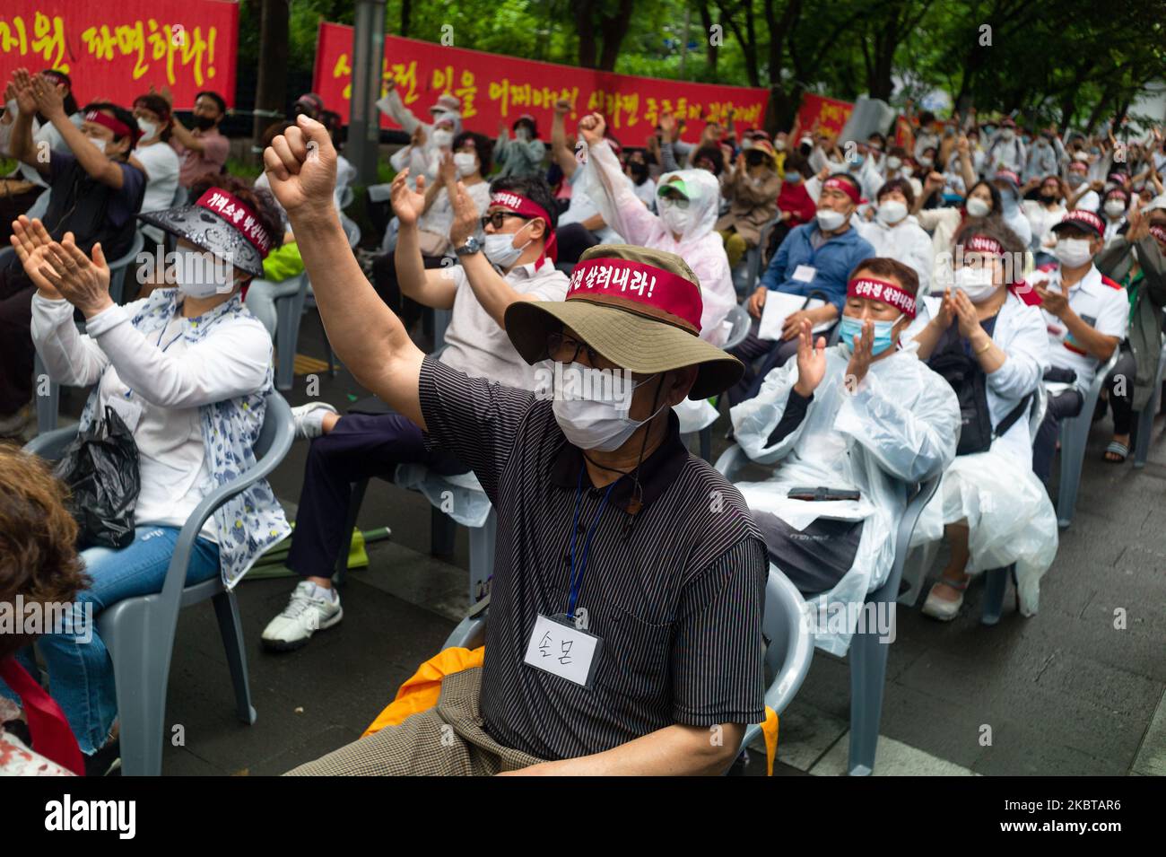 Members of the SillaJen Action Group gather for a rally in front of the Korea Exchange in Yeouido, Yeongdeungpo-gu, Seoul in South Korea on July 10, 2020 to urge the recovery of SillaJen sovereignty and resumption of transactions. (Photo by Chris Jung/NurPhoto) Stock Photo