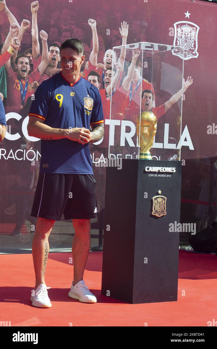 Former soccer player Fernando Torres pose with the World Cup conquered in 2010 by the Spanish team during the event held today in the Plaza de Colon, in Madrid, in commemoration of the tenth anniversary of Spain's victory in the World Cup. July 2020 Spain (Photo by Oscar Gonzalez/NurPhoto) Stock Photo