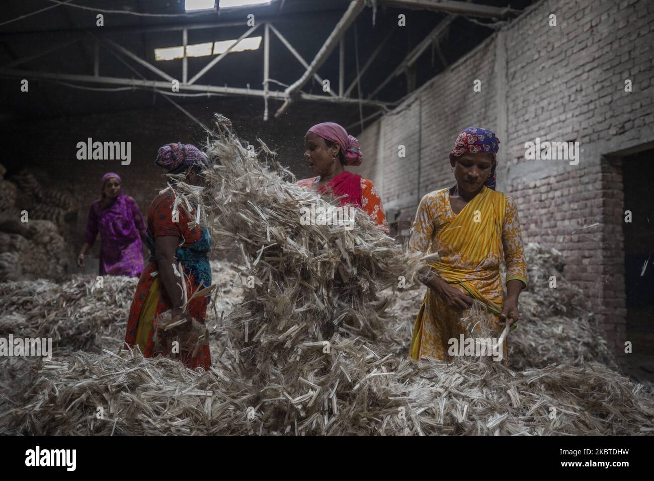 Women works at a jute processing factory in Narayanganj near Dhaka