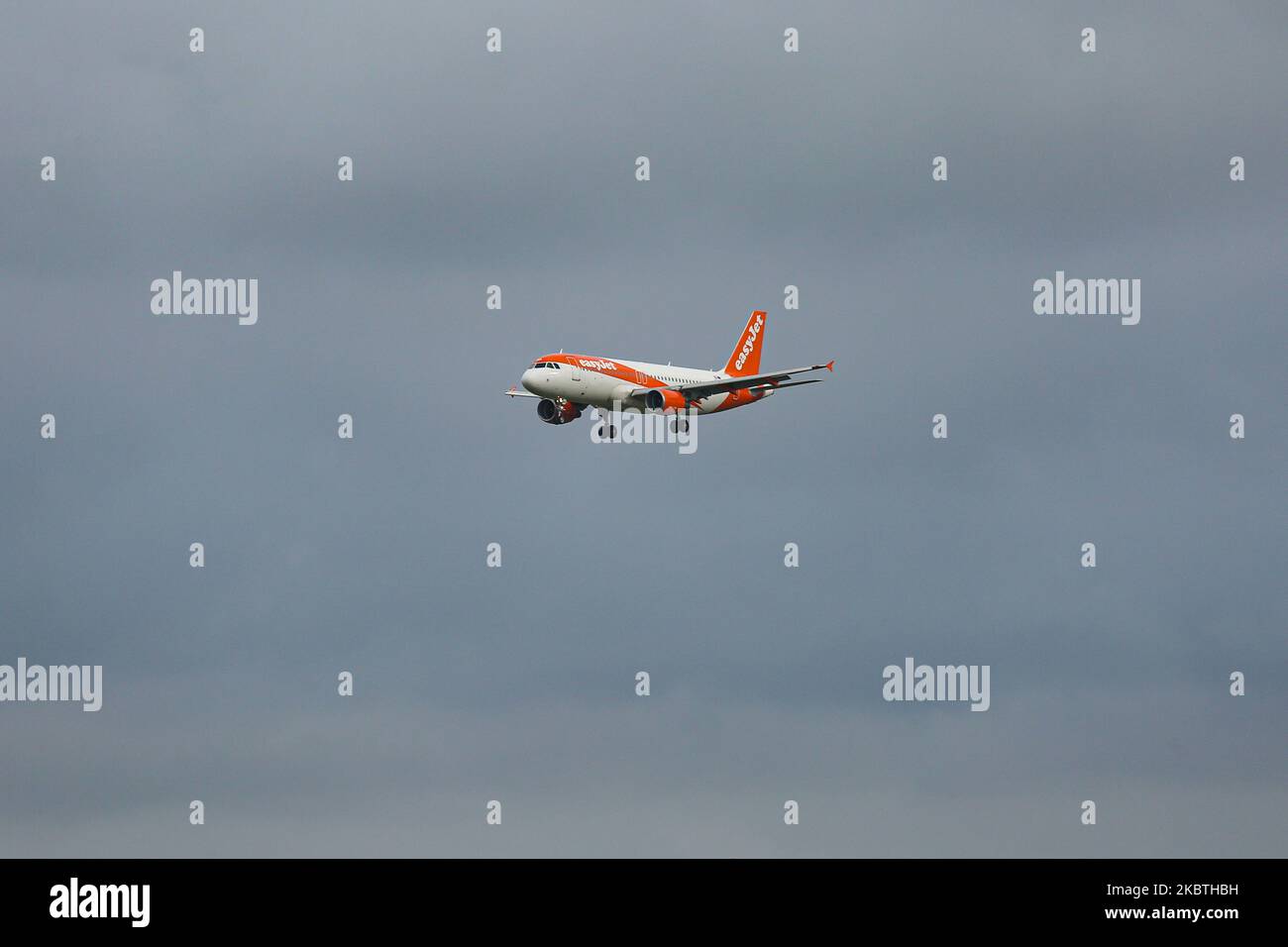 EasyJet Europe low cost airline Airbus A320 aircraft as seen on final approach on final flying, touch down, landing and breaking phase at Amsterdam Schiphol AMS EHAM International Airport in the Netherlands on July 2, 2020. The British budget carrier with headquarters in London, U2 Easy Jet is flying an all airbus fleet. The specific narrow body airplane has the registration OE-INP and 2x CFMI engines and is the branch part of EasyJet Europe Airline BmbH fleet EC EJU ALPINE based in Vienna. (Photo by Nicolas Economou/NurPhoto) Stock Photo