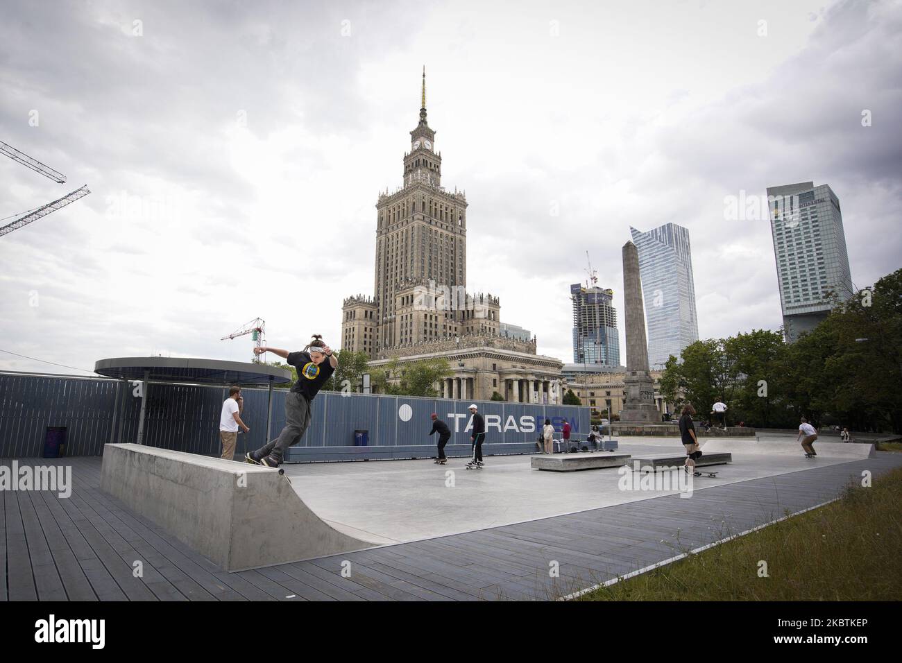People are seen skating on a ramp near the Palace of Culture and Sciences in Warsaw, Poland on July 13, 2020. Incumbent Duda has won the final round of the presidential elections with less than three percent of the votes against his opponent, mayor of Warsaw Rafal Trzaskowski. Incumbent Duda has won the final round of the presidential elections with less than three percent of the votes against his opponent, mayor of Warsaw Rafal Trzaskowski. Of the age groups that voted for opponent the majority was younger than 50 with nearly 70 percent of unde 30's voting for Trzaskowski. (Photo by Jaap Arri Stock Photo
