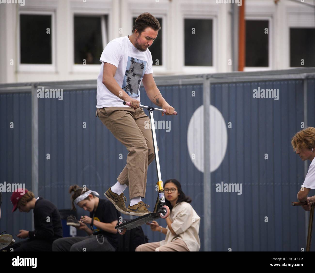 A young man is seen jumping off of a ramp on a scooter in Warsaw, Poland on July 13, 2020. Incumbent Duda has won the final round of the presidential elections with less than three percent of the votes against his opponent, mayor of Warsaw Rafal Trzaskowski. Of the age groups that voted for opponent the majority was younger than 50 with nearly 70 percent of unde 30's voting for Trzaskowski. (Photo by Jaap Arriens/NurPhoto) Stock Photo