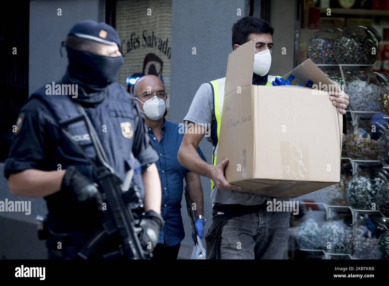 Members of the Catalan regional police force Mossos d'Esquadra stand guard during an counter-terrorism operation in Barcelona, on July 14, 2020. The Catalan Police, the Mossos d'Esquadra, arrested two people. These are the two main objectives of the operation, supervised by the central court of instruction number 6 of the Spanish High Court. (Photo by Albert Llop/NurPhoto) Stock Photo