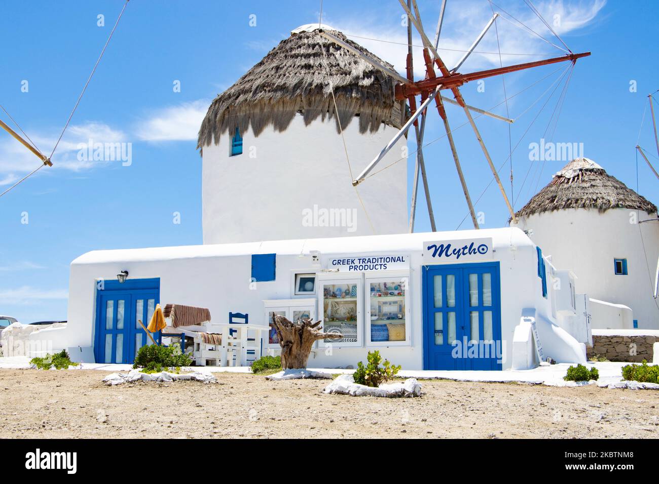 The iconic windmills in Mykonos island, Cyclades islands, Aegean Sea, Greece on July 14, 2020. There is almost nobody at the windmills because of the Coronavirus pandemic measures and traffic ban that Greece applied. There are 16 windmills on the island, 5 of them above Chora or Mykonos Town, the main town on the island. The windmills were built in the 16th century from the Venetians but their constructions continued until the 20th century. The famous Mediterranean Greek island is nicknamed as The Island of the Winds with whitewashed traditional buildings like windmills or little church. Mykon Stock Photo