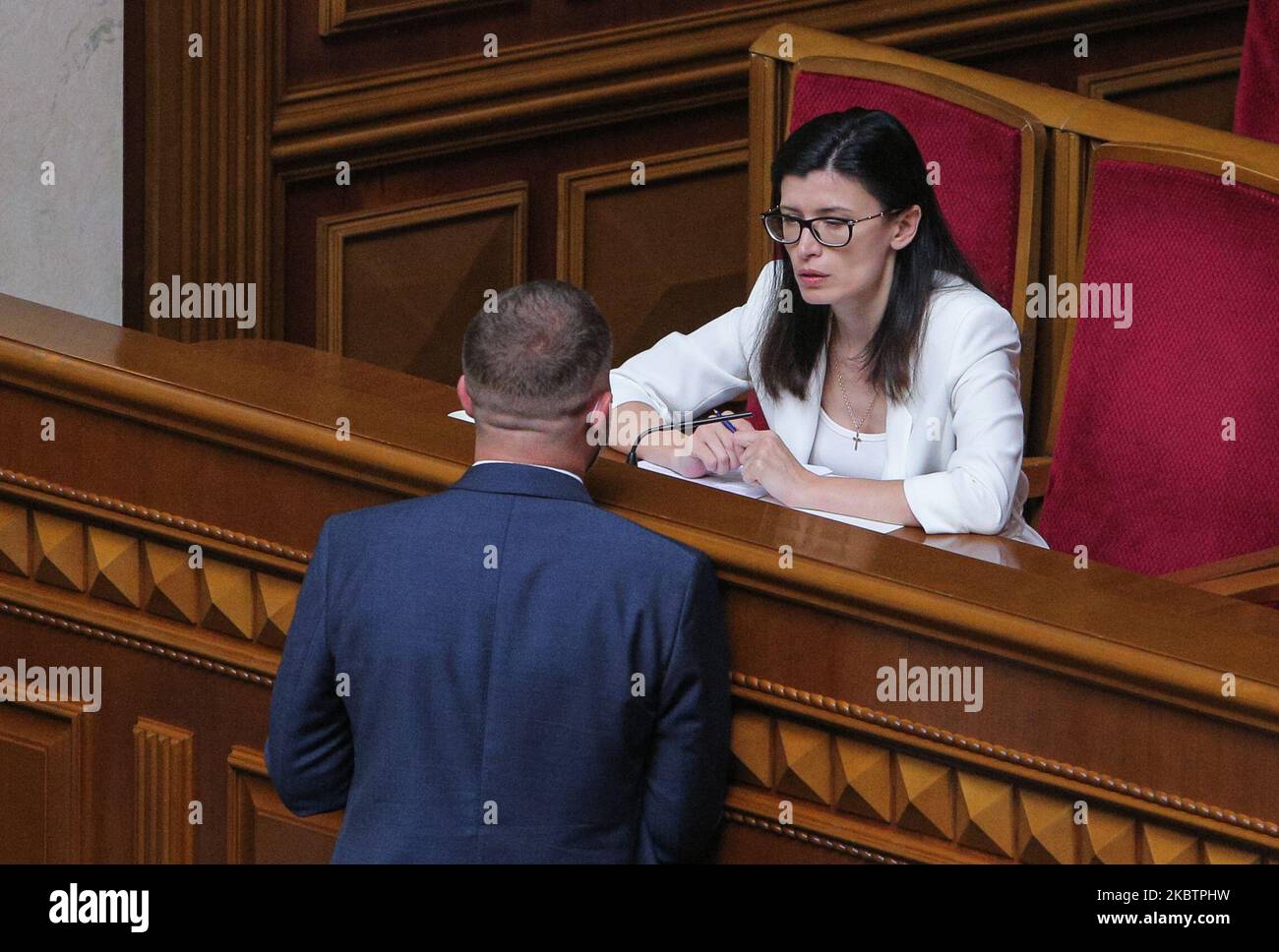 A head of Antimonopoly Committee Olha Pishchanska (R)talks to lawmaker during the session of Parliament in Kyiv, Ukraine, July 16, 2020. Ukrainian Parliament voted for Heads of Central Bank, Antimonopoly Committee and appointed new Vice minister, Minister for Strategic Industries. (Photo by Sergii Kharchenko/NurPhoto) Stock Photo