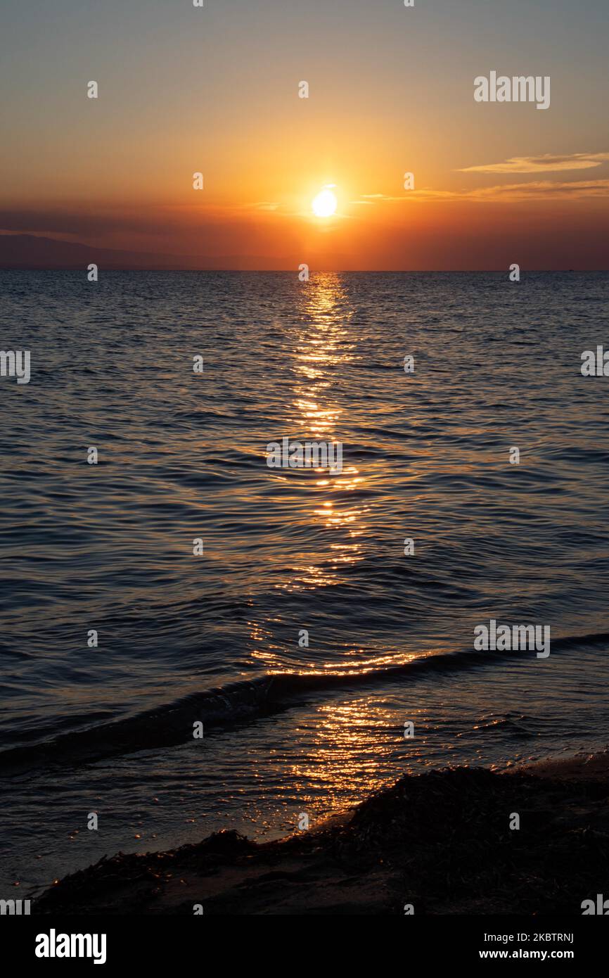 Sunset time at the beach of Paralia Epanomi in Greece on July 16, 2020