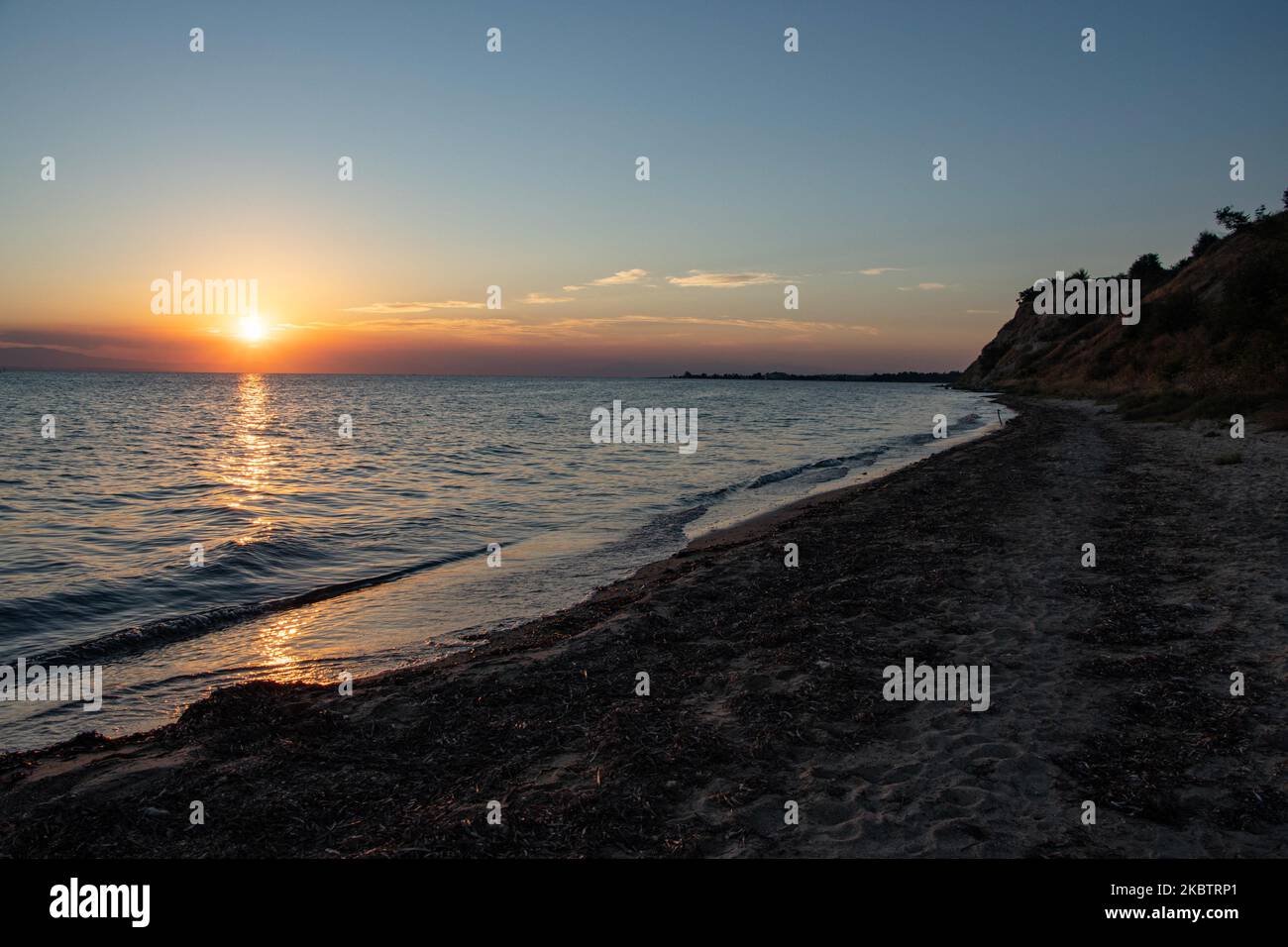 Sunset time at the beach of Paralia Epanomi in Greece on July 16, 2020
