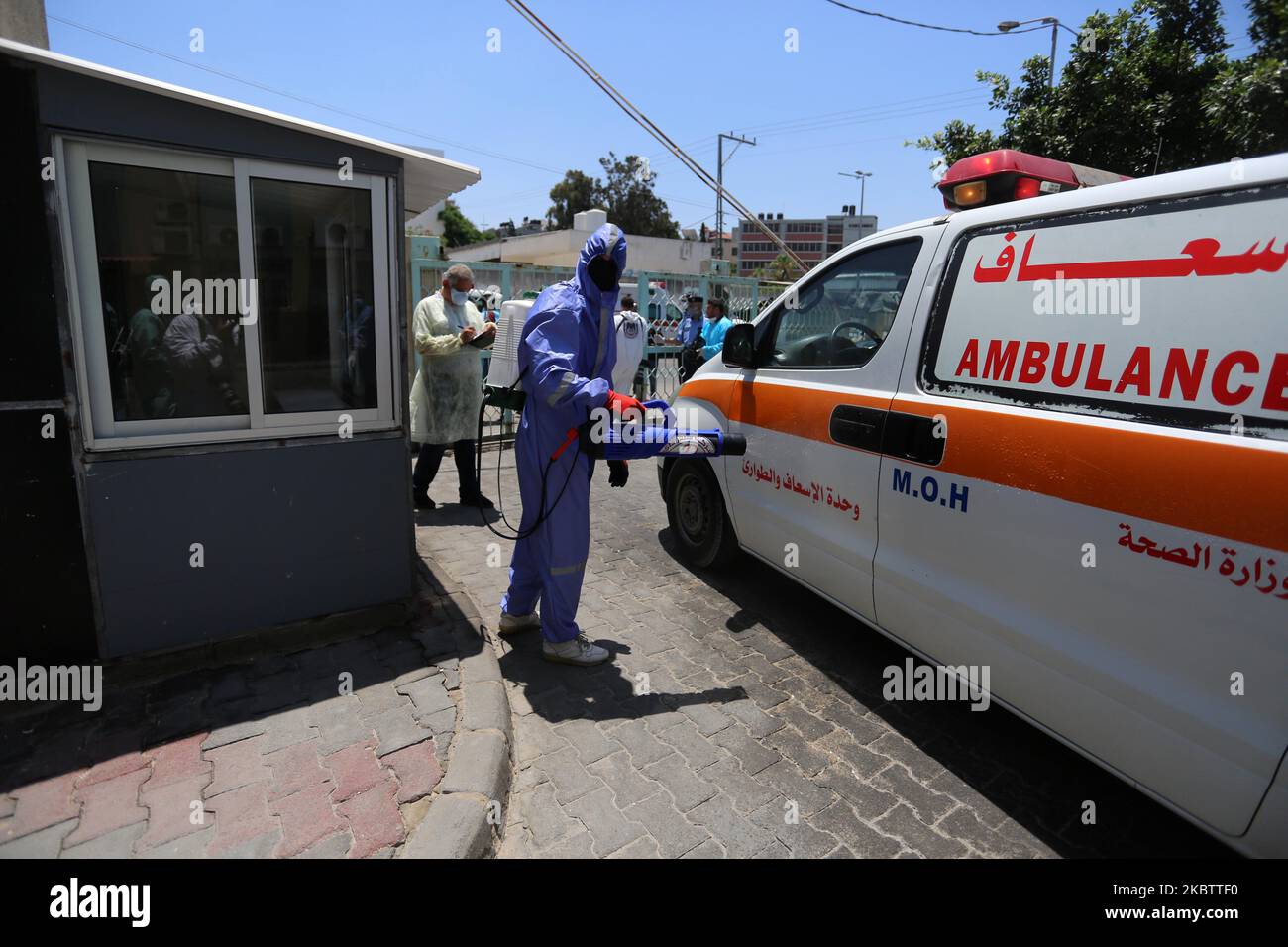 Palestinian staff from the Ministry of Health wear protective gear and Palestinian policemen, take part in a simulation training, against the coronavirus disease (COVID-19), organized by the Ministries of Health and the Interior, at a hospital in Gaza city, on July 18, 2020. (Photo by Majdi Fathi/NurPhoto) Stock Photo