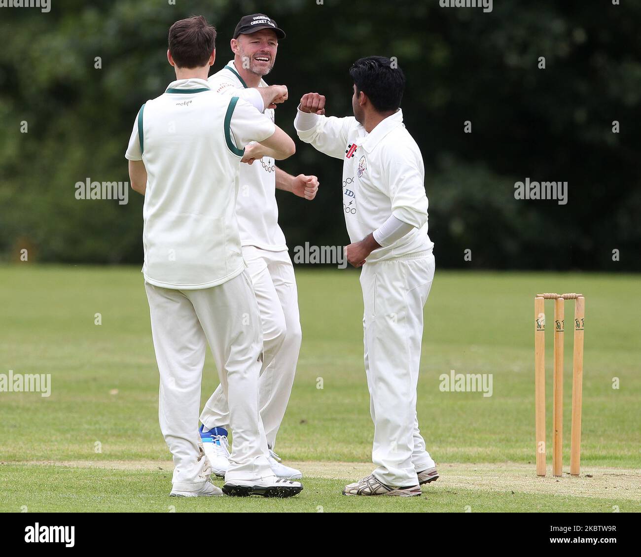 Players during the Great Ayton vs Thornaby cricket match in the North Yorkshire & South Durham League Premier Division celebrate by bumping elbows rather than touching hands or hugging to help stop the spread of COVID-19 on Saturday 18th July 2020 in Middlesbrough, England. (Photo by Mark Fletcher/MI News/NurPhoto) Stock Photo